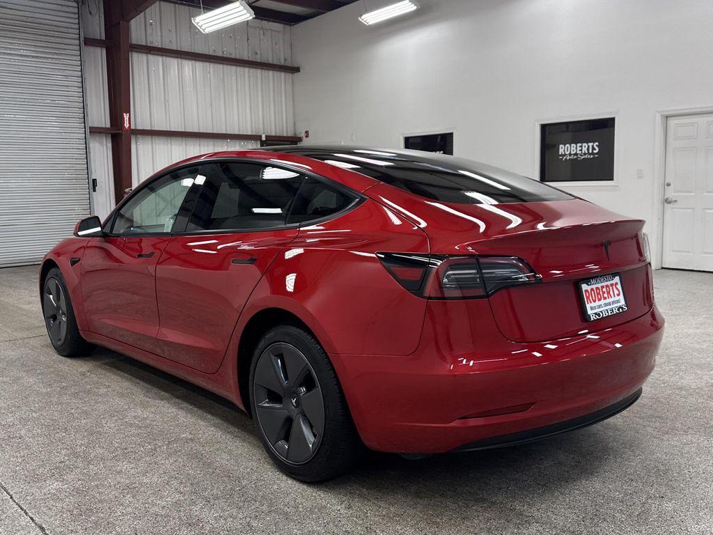 used 2023 Tesla Model 3 car, priced at $28,497