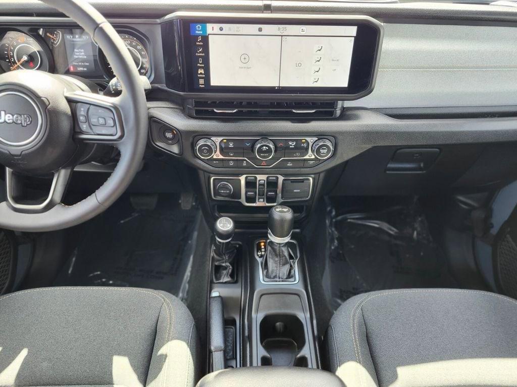 used 2024 Jeep Wrangler car, priced at $40,373
