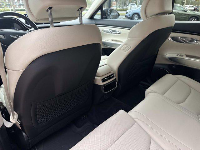 used 2023 Genesis GV70 car, priced at $32,890