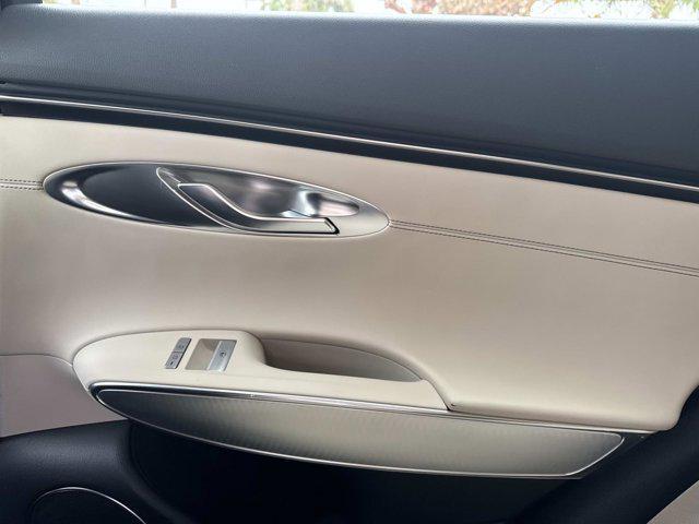 used 2023 Genesis GV70 car, priced at $32,890