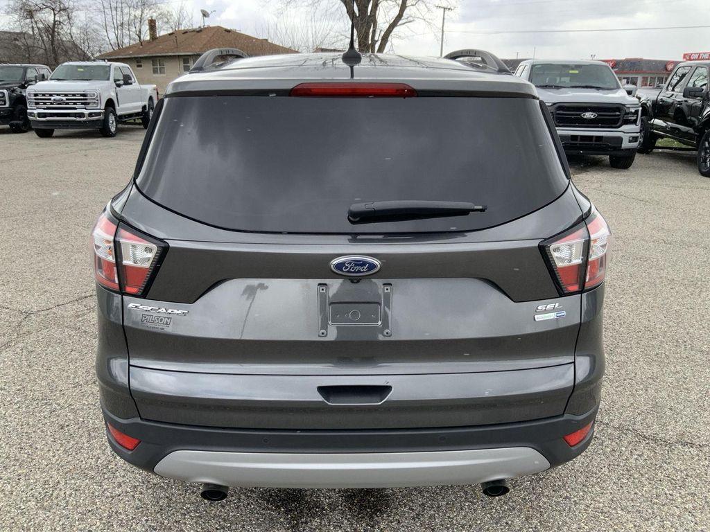 used 2018 Ford Escape car, priced at $15,500