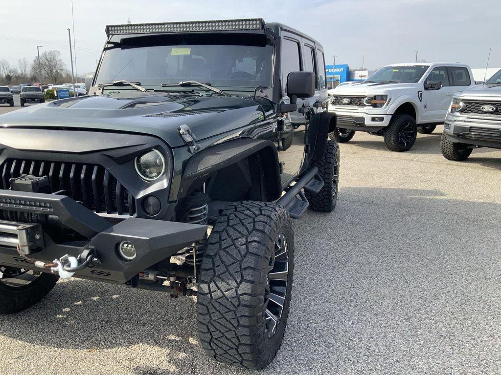 used 2011 Jeep Wrangler Unlimited car, priced at $16,000