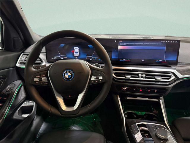 used 2023 BMW 330e car, priced at $30,000
