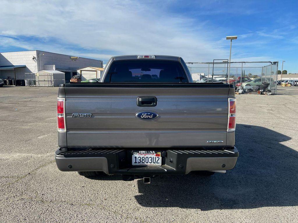 used 2014 Ford F-150 car, priced at $12,896