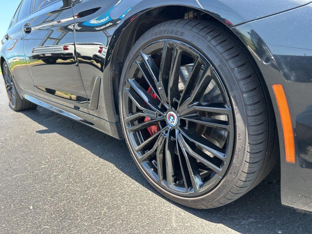 used 2023 BMW M550 car, priced at $61,883