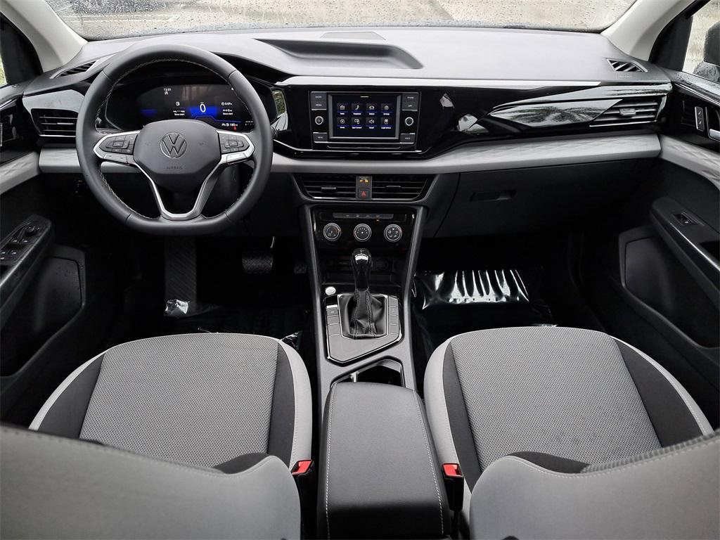 used 2023 Volkswagen Taos car, priced at $18,795