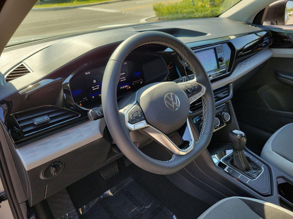 used 2023 Volkswagen Taos car, priced at $18,995