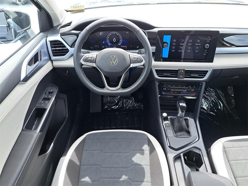 new 2025 Volkswagen Taos car, priced at $26,512
