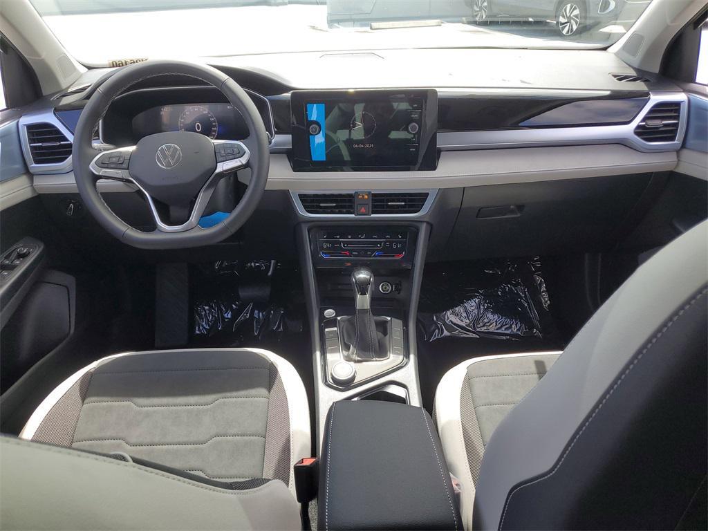 new 2025 Volkswagen Taos car, priced at $27,111