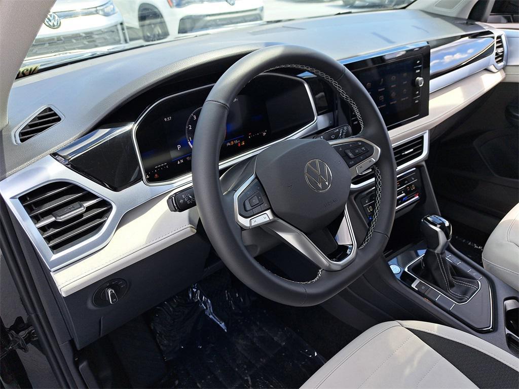 new 2025 Volkswagen Taos car, priced at $24,996