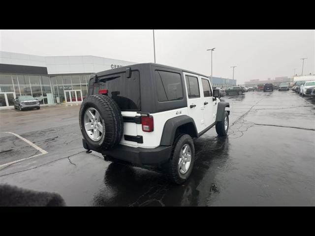 used 2014 Jeep Wrangler Unlimited car, priced at $13,445