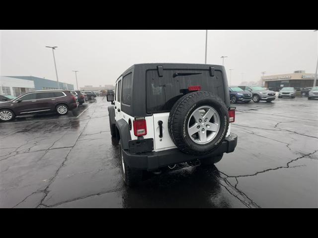 used 2014 Jeep Wrangler Unlimited car, priced at $13,445