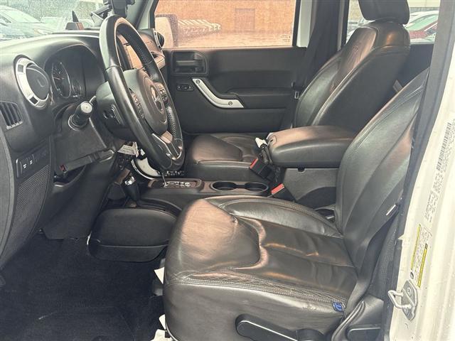 used 2014 Jeep Wrangler Unlimited car, priced at $13,445