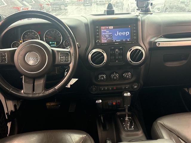 used 2014 Jeep Wrangler Unlimited car, priced at $13,445