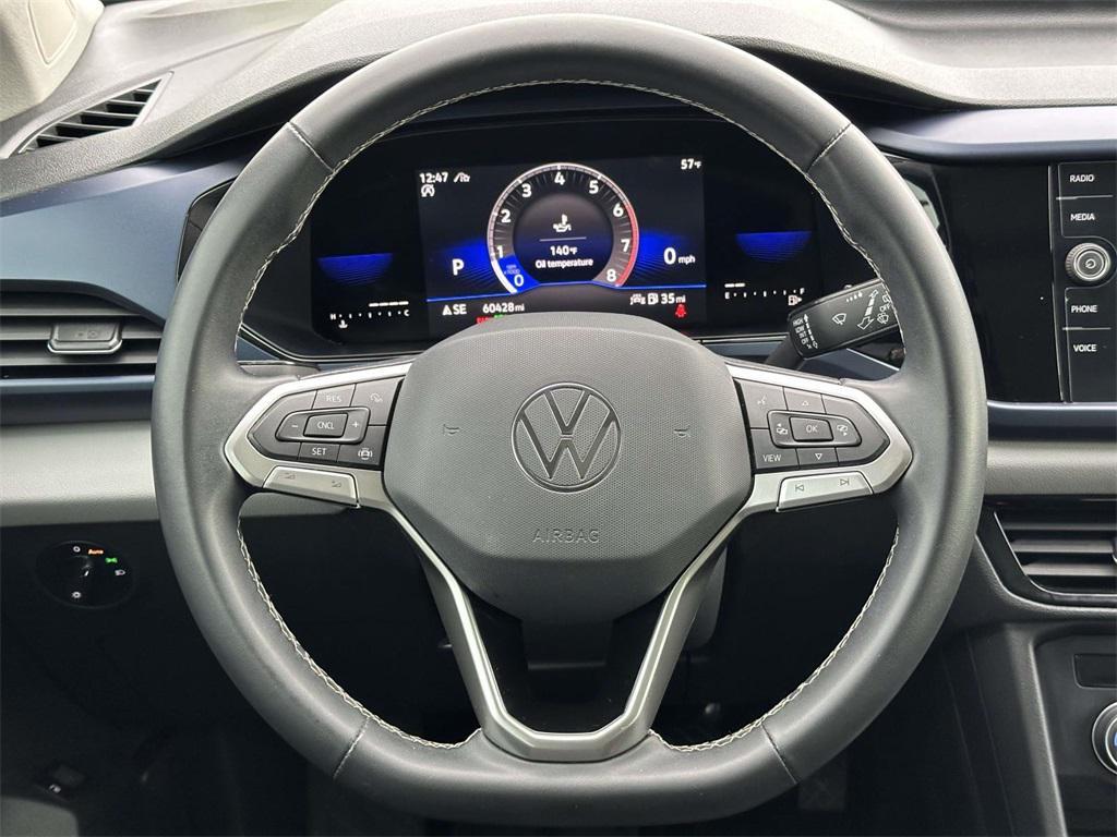used 2022 Volkswagen Taos car, priced at $17,000