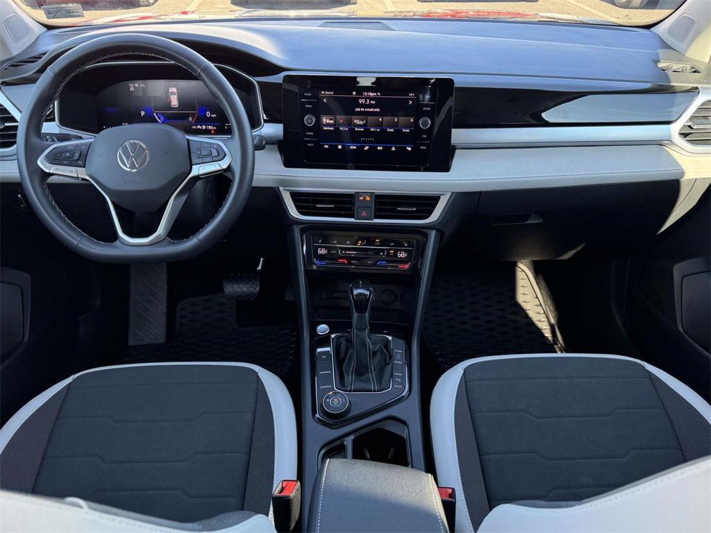 used 2025 Volkswagen Taos car, priced at $25,000
