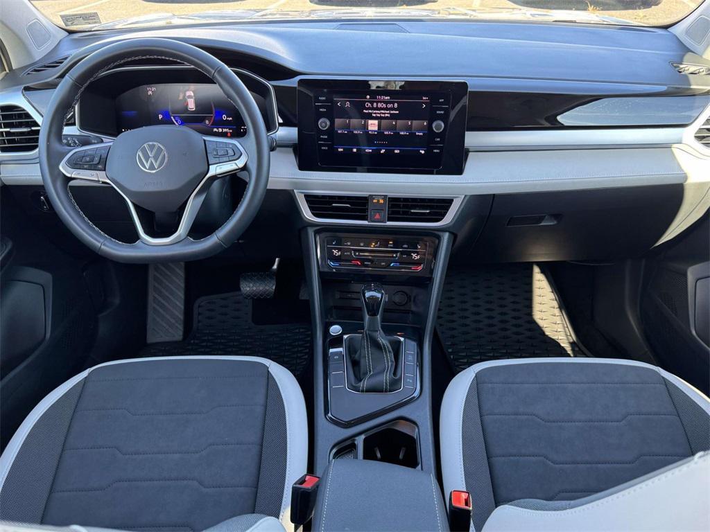 used 2025 Volkswagen Taos car, priced at $25,000