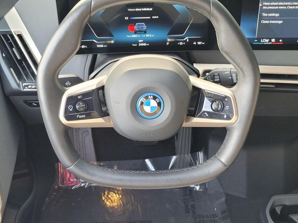 used 2024 BMW iX car, priced at $49,998