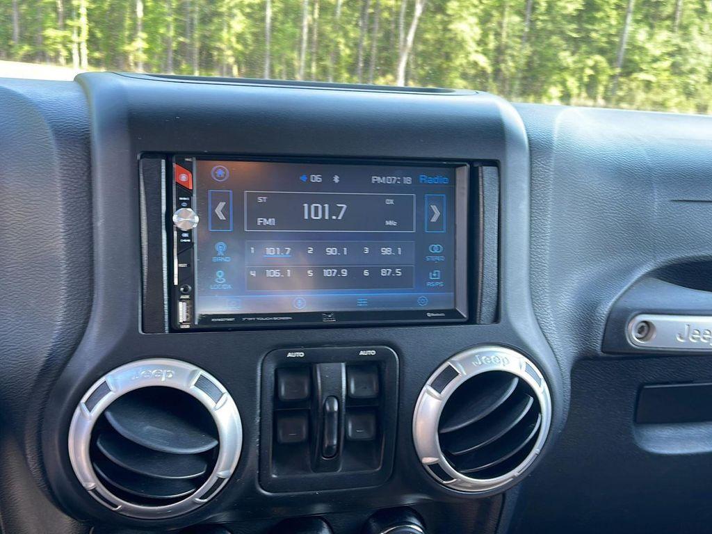 used 2011 Jeep Wrangler Unlimited car, priced at $13,048