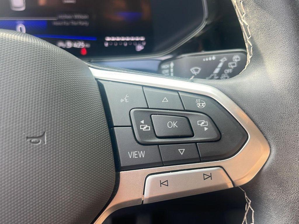 used 2024 Volkswagen Taos car, priced at $23,148