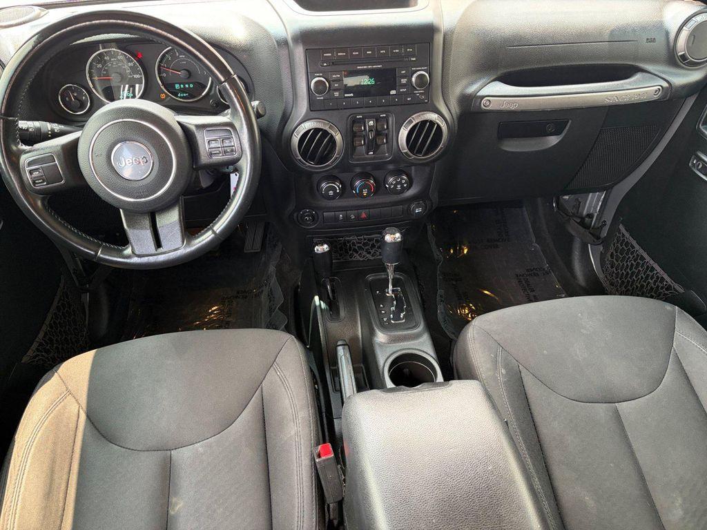 used 2018 Jeep Wrangler JK Unlimited car, priced at $19,999