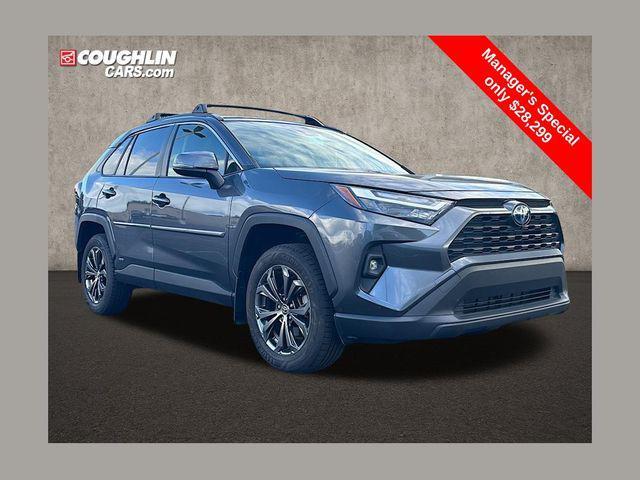 used 2022 Toyota RAV4 Hybrid car, priced at $28,299