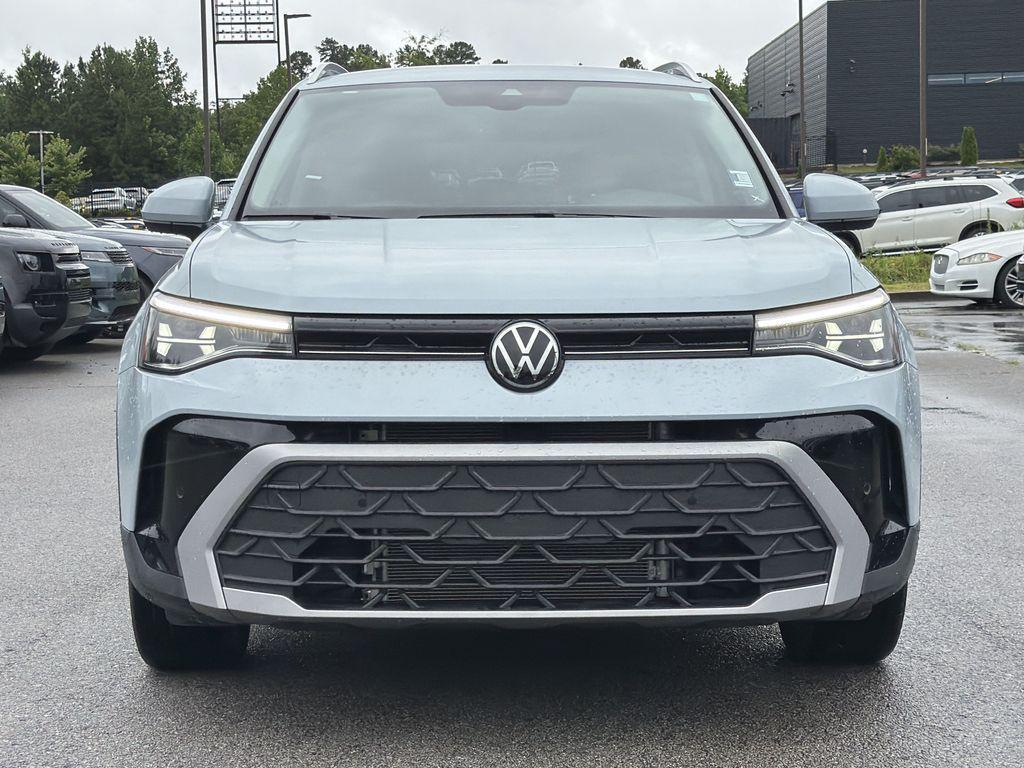 used 2025 Volkswagen Taos car, priced at $25,000