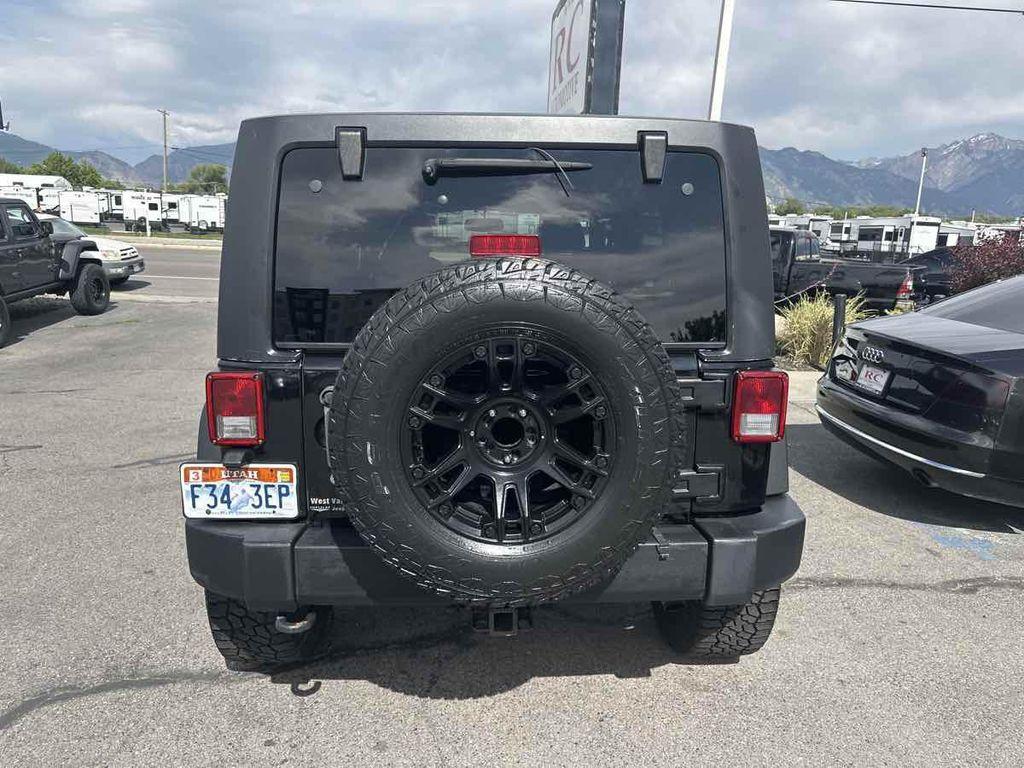 used 2013 Jeep Wrangler Unlimited car, priced at $14,495
