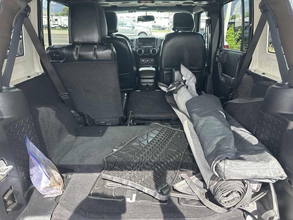 used 2013 Jeep Wrangler Unlimited car, priced at $14,495