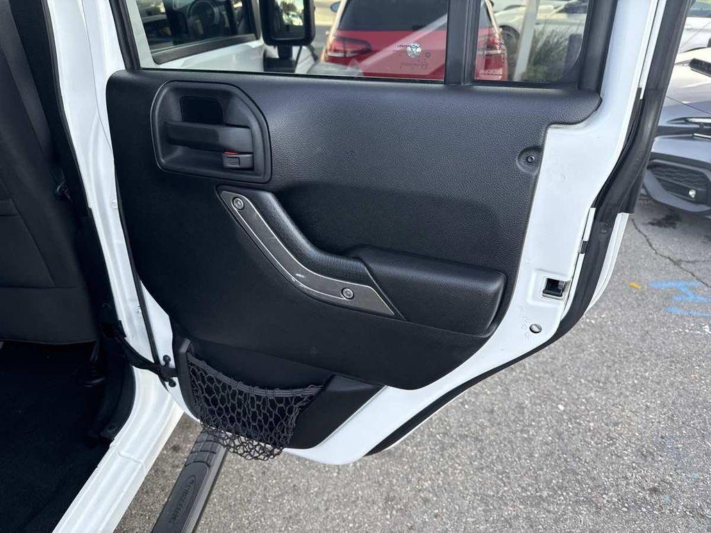 used 2015 Jeep Wrangler Unlimited car, priced at $18,910