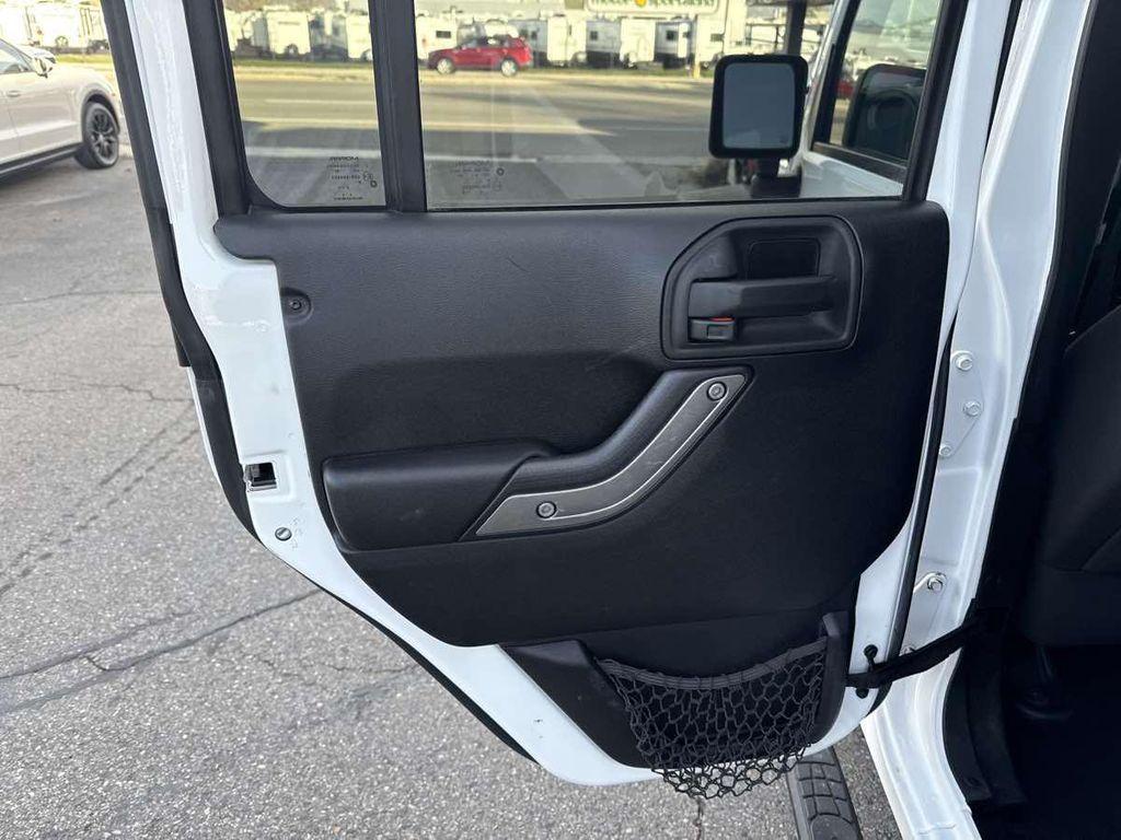 used 2015 Jeep Wrangler Unlimited car, priced at $18,910