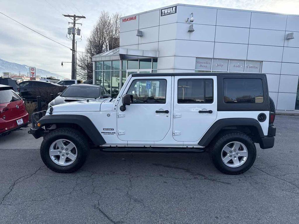 used 2015 Jeep Wrangler Unlimited car, priced at $18,910
