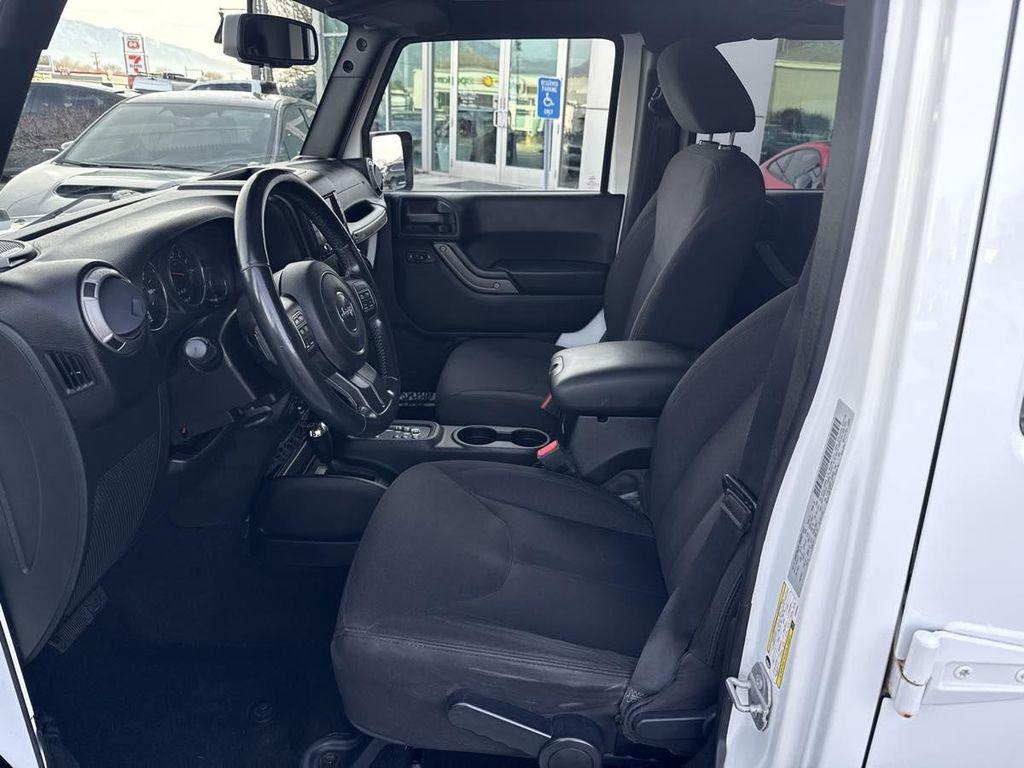 used 2015 Jeep Wrangler Unlimited car, priced at $18,910