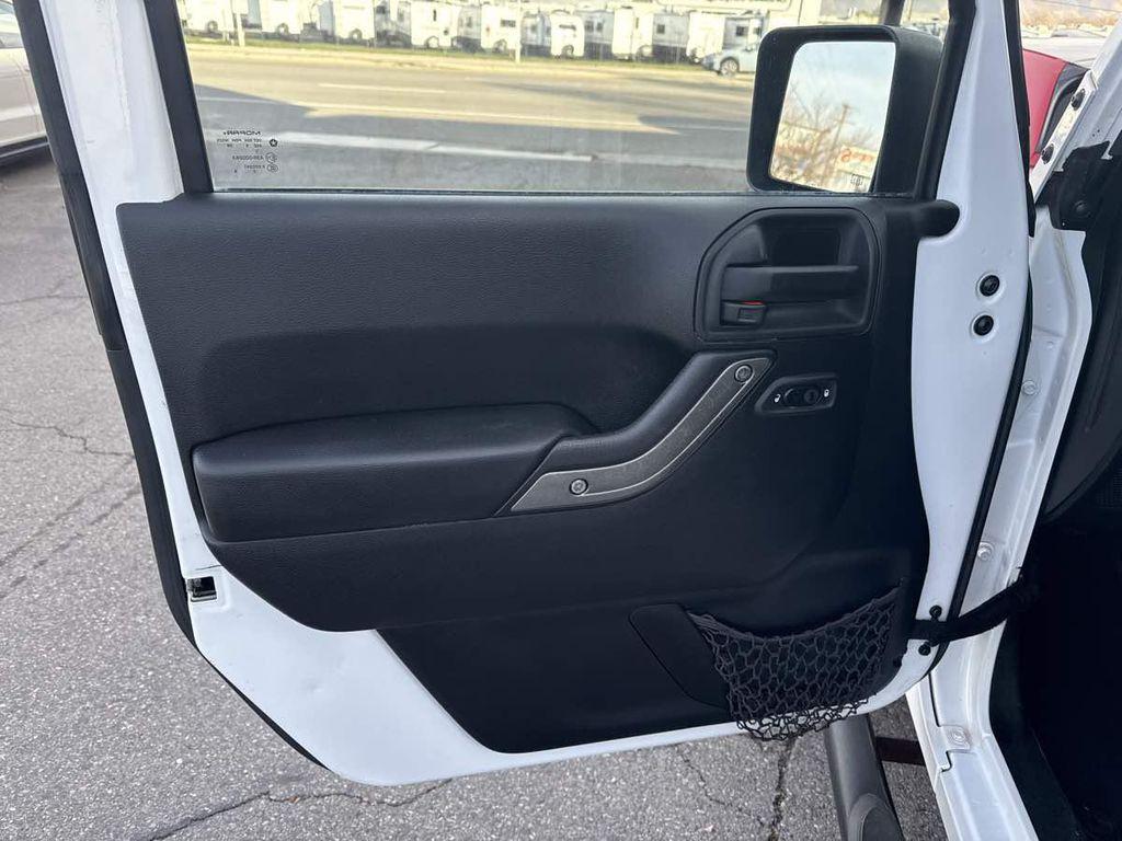 used 2015 Jeep Wrangler Unlimited car, priced at $18,910