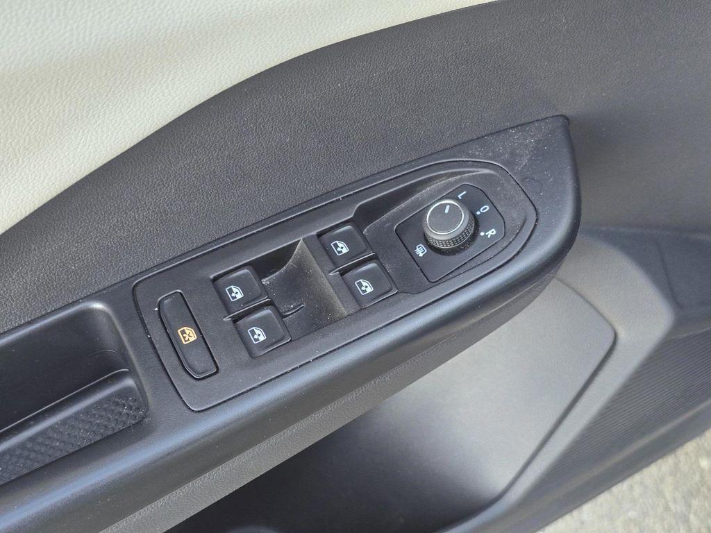 used 2025 Volkswagen Taos car, priced at $22,400