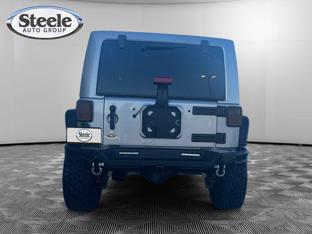 used 2014 Jeep Wrangler Unlimited car, priced at $18,991