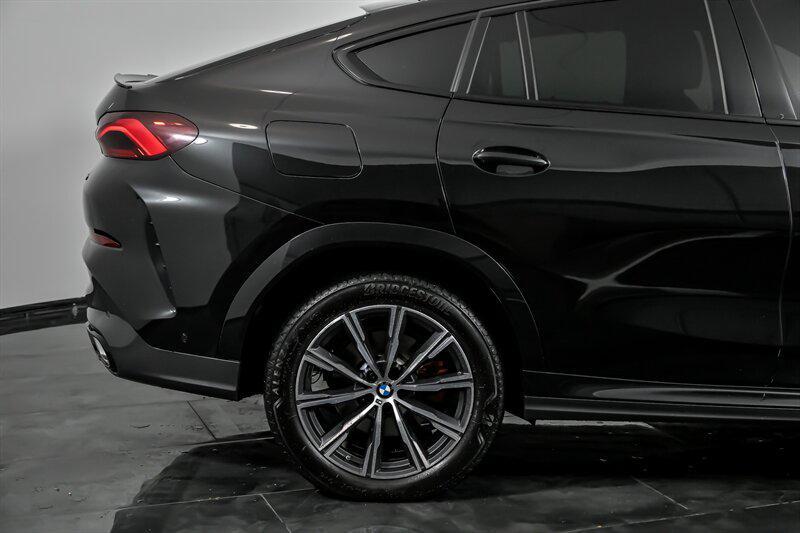 used 2023 BMW X6 car, priced at $49,995