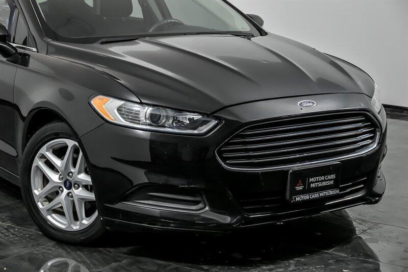 used 2015 Ford Fusion car, priced at $7,995