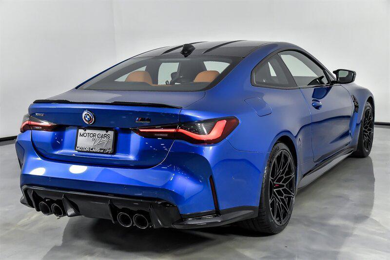 used 2023 BMW M4 car, priced at $84,995