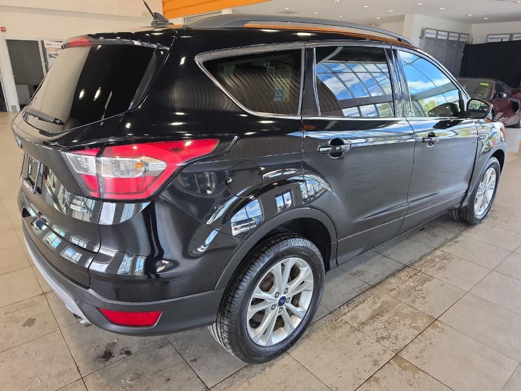 used 2018 Ford Escape car, priced at $12,900