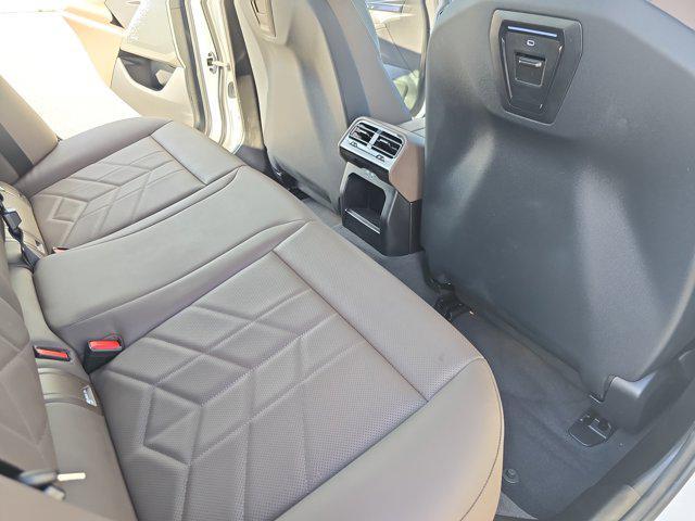 used 2024 BMW i5 car, priced at $46,176