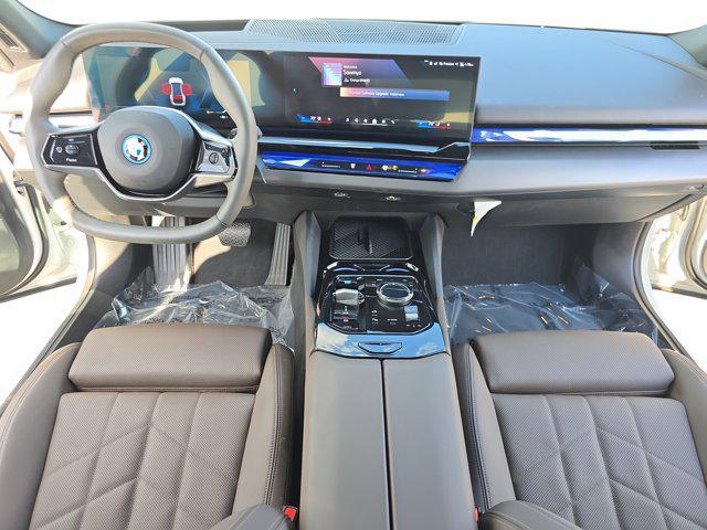 used 2024 BMW i5 car, priced at $46,176