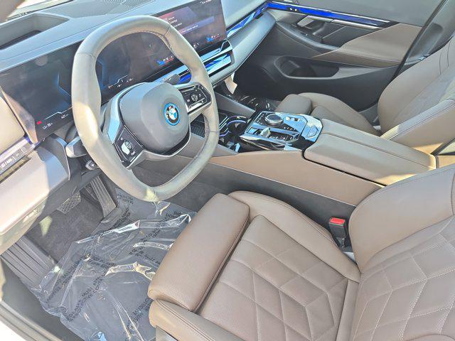 used 2024 BMW i5 car, priced at $46,176