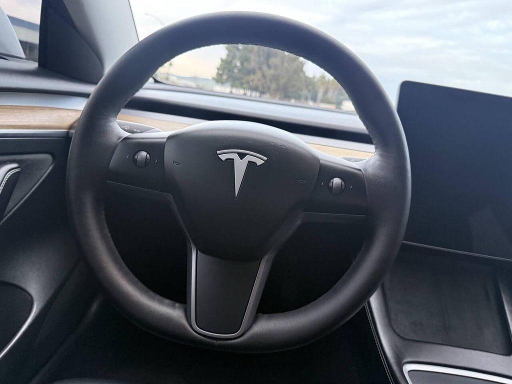 used 2023 Tesla Model 3 car, priced at $20,999