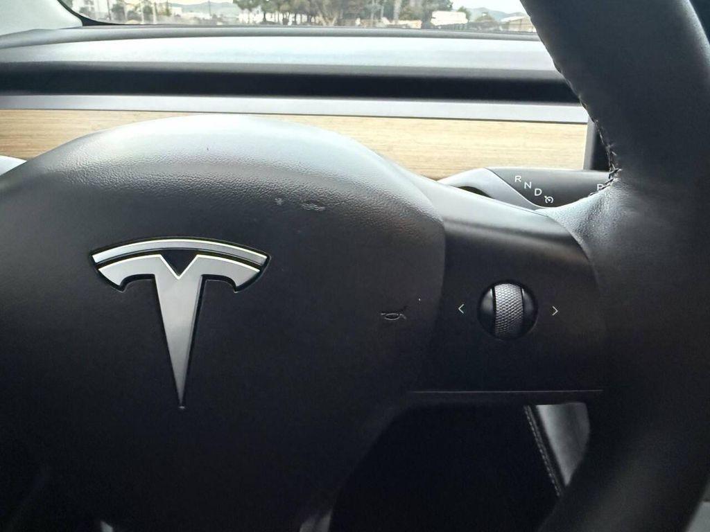 used 2023 Tesla Model 3 car, priced at $20,999