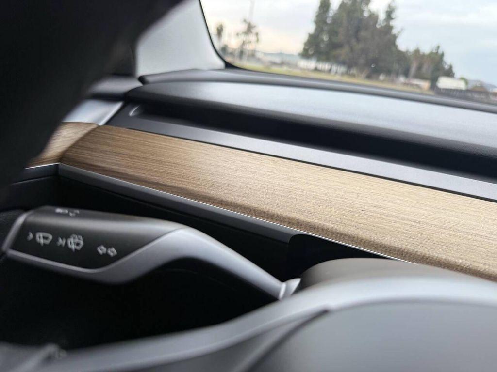 used 2023 Tesla Model 3 car, priced at $20,999