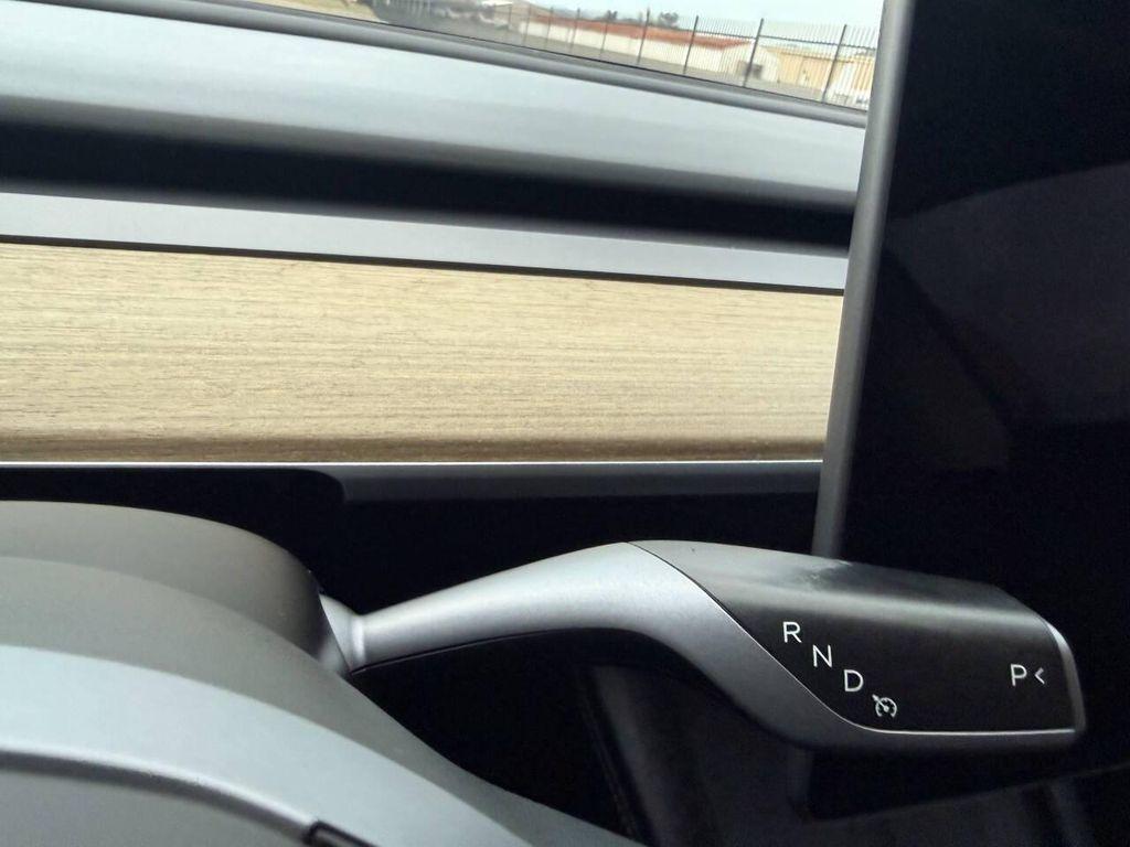 used 2023 Tesla Model 3 car, priced at $20,999