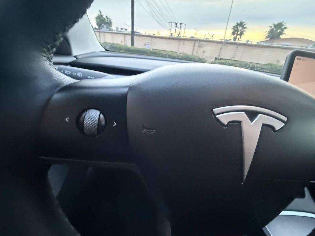 used 2023 Tesla Model 3 car, priced at $21,999