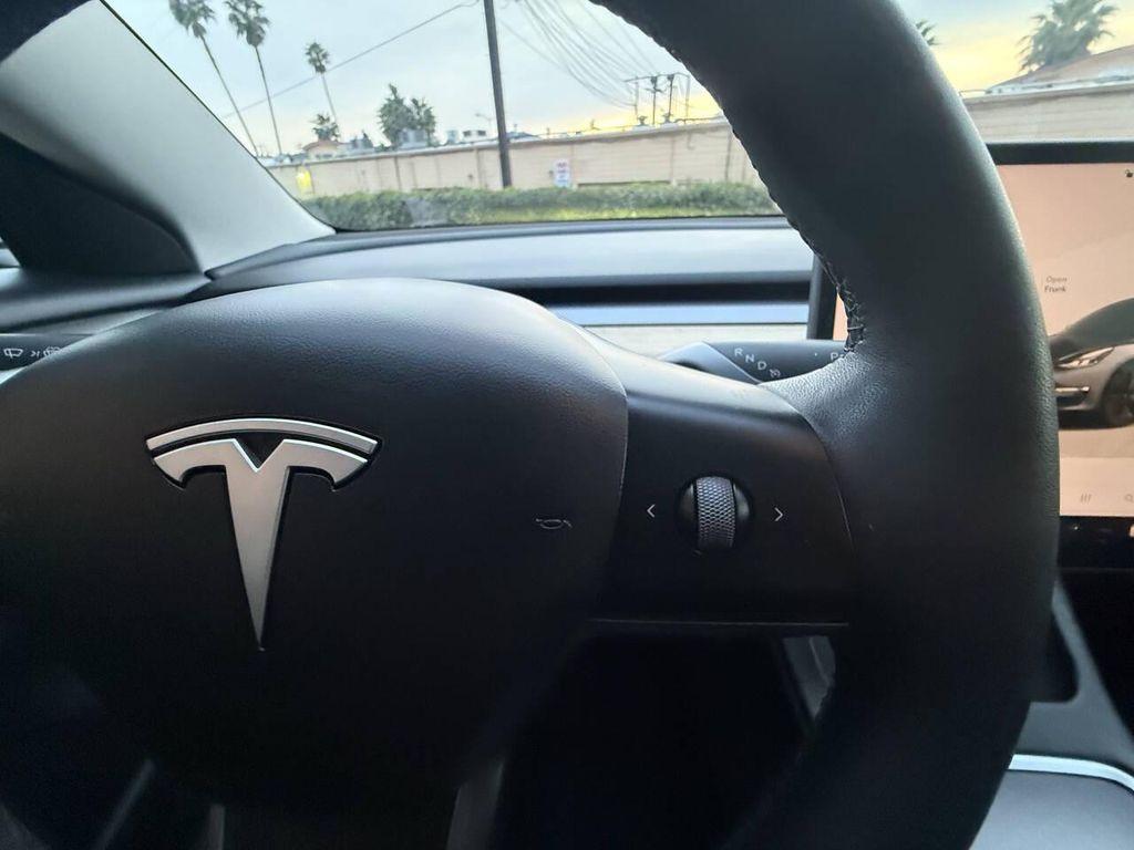used 2023 Tesla Model 3 car, priced at $21,999