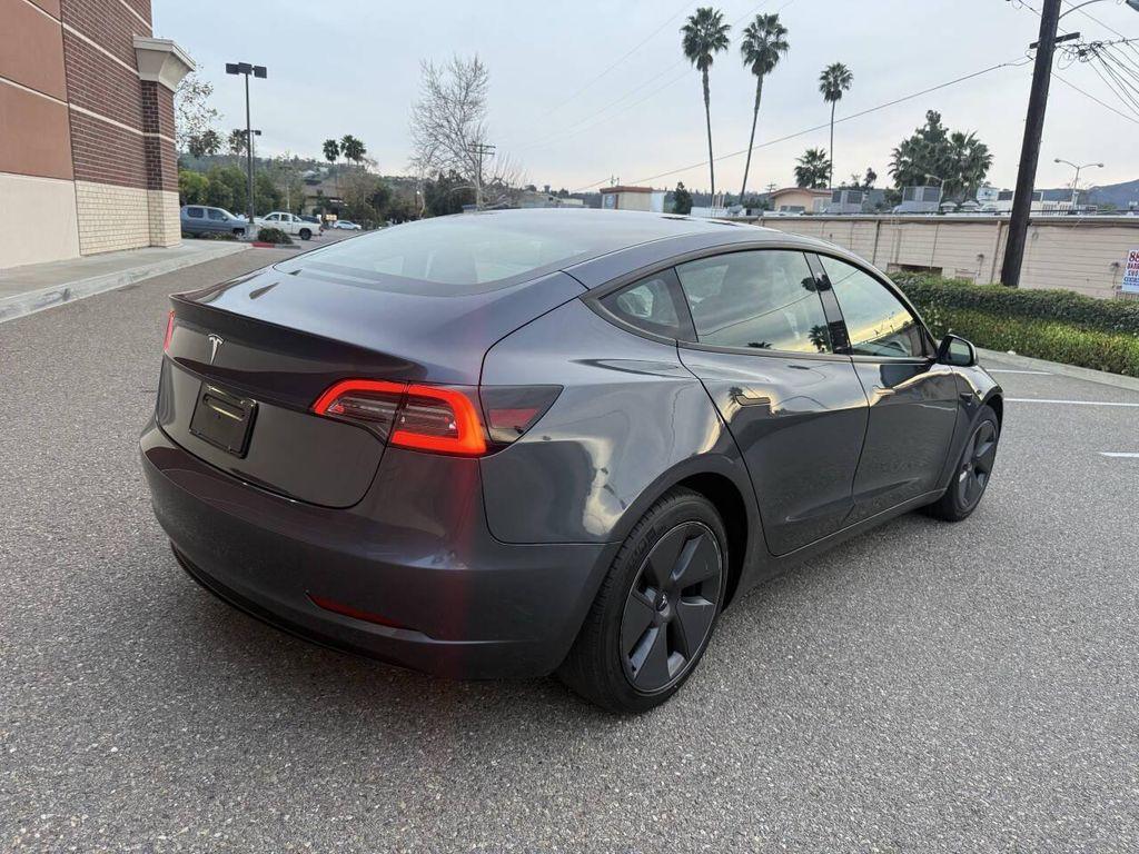 used 2023 Tesla Model 3 car, priced at $21,999